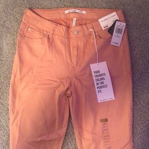 Celebrity Pink “Rose Tan” mid-rise skinny jeans